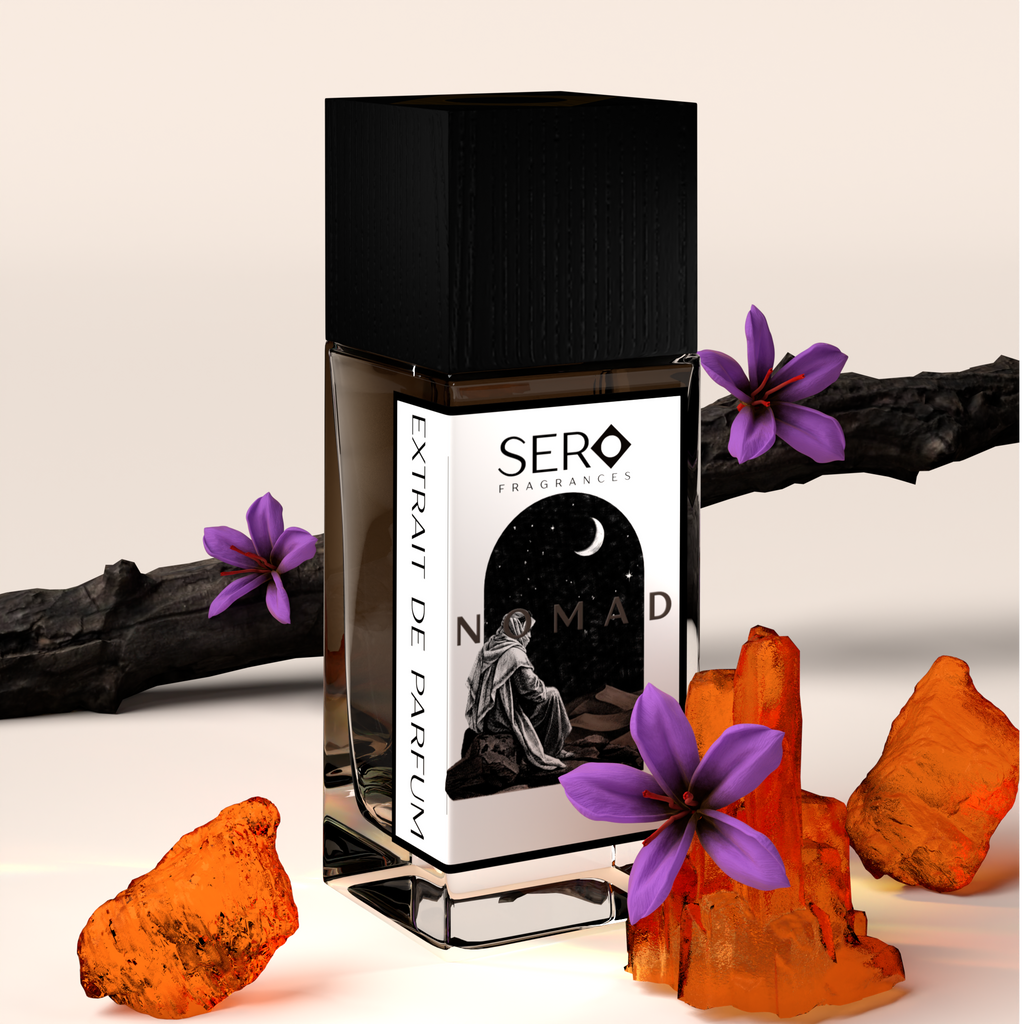 corner view of a minimalist clear glass perfume bottle with black cap containing SERO fragrance inspired by LV Ombre Nomad.
